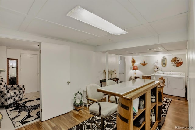 6416 Zang Ct, Arvada, CO 80004 - dining room with wood finished floors and washing machine and dryer