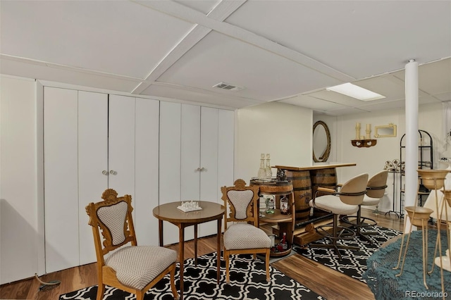 6416 Zang Ct, Arvada, CO 80004 - dining space featuring wood finished floors and a dry bar