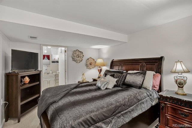 6416 Zang Ct, Arvada, CO 80004 - bedroom featuring light colored carpet and ensuite bathroom