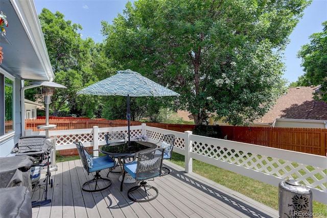 6416 Zang Ct, Arvada, CO 80004 - wooden deck featuring outdoor dining area