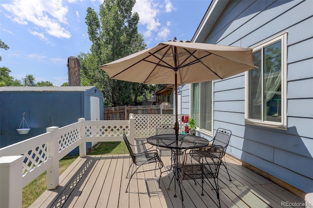 6416 Zang Ct, Arvada, CO 80004 - wooden deck featuring outdoor dining space