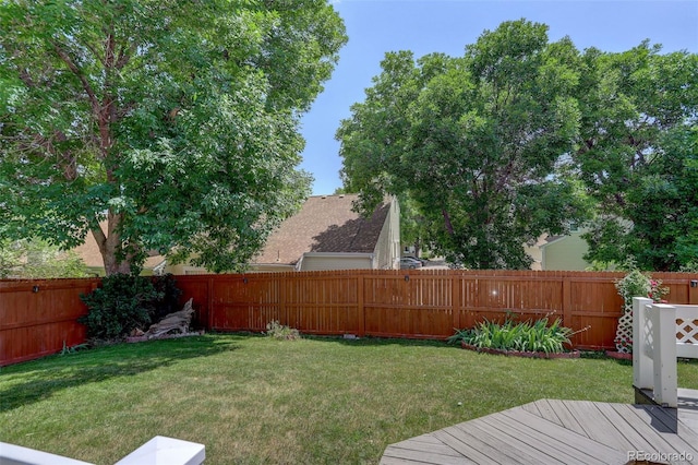 6416 Zang Ct, Arvada, CO 80004 - fenced backyard featuring a wooden deck