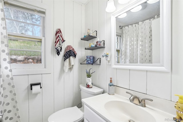 11827 Brook Rd, Golden, CO 80403 - full bathroom with vanity, toilet, and a shower with curtain