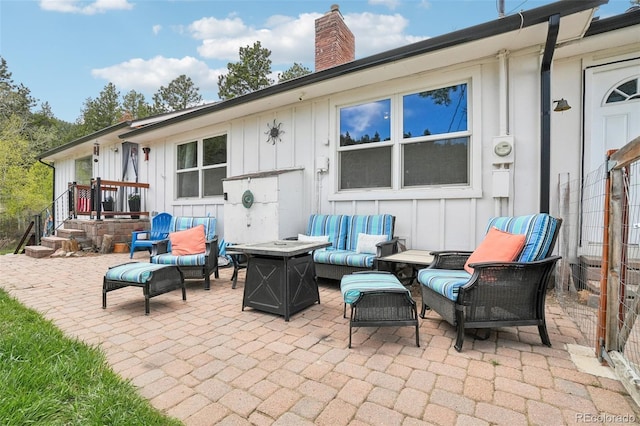 11827 Brook Rd, Golden, CO 80403 - view of patio / terrace featuring an outdoor living space with a fire pit