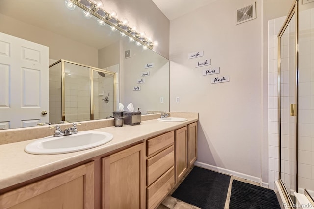 2951 W Riverwalk Cir Unit N, Littleton, CO 80123 - full bathroom with a stall shower and double vanity