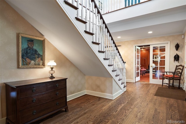 staircase featuring french doors, wood finished floors, baseboards, recessed lighting, and ornamental molding