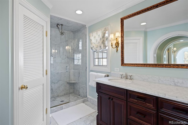bathroom with marble finish floors, a marble finish shower, plenty of natural light, recessed lighting, and ornamental molding