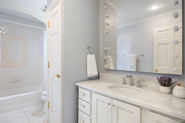 bathroom with crown molding, vanity, tile patterned flooring, toilet, and shower / bathtub combination