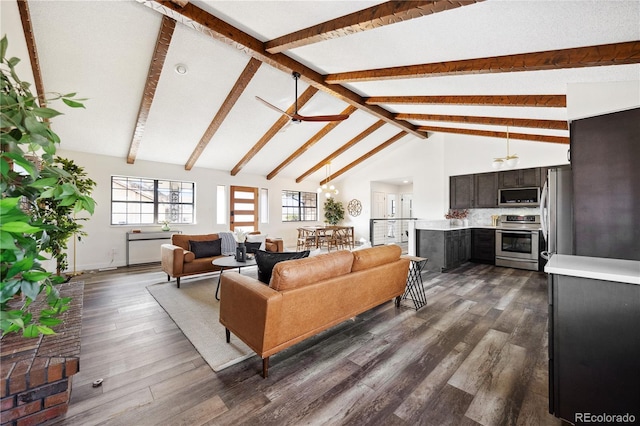 living room with dark wood-type flooring, beamed ceiling, a ceiling fan, and high vaulted ceiling