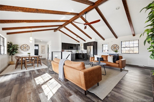 living room featuring dark wood-type flooring, beamed ceiling, and high vaulted ceiling