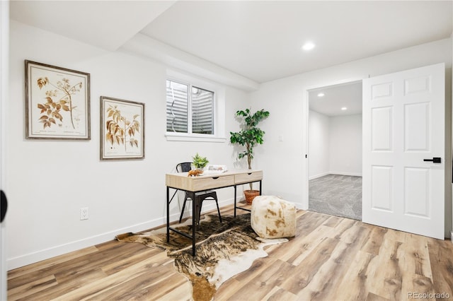 office area featuring light wood finished floors, recessed lighting, and baseboards