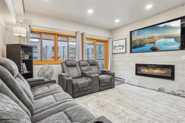 645 S Park Ave Unit 302, Breckenridge, CO 80424 - living area with recessed lighting, a large fireplace, baseboard heating, and wood finished floors