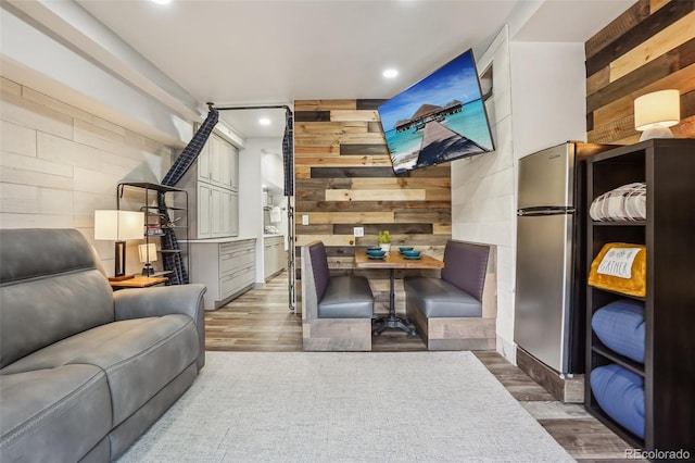 645 S Park Ave Unit 302, Breckenridge, CO 80424 - living area with wooden walls, recessed lighting, and wood finished floors