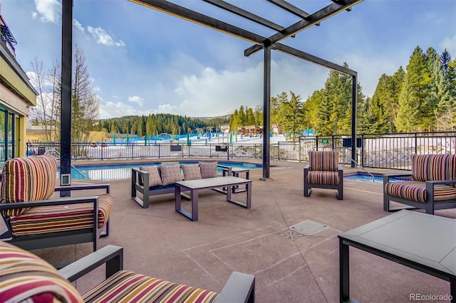 645 S Park Ave Unit 302, Breckenridge, CO 80424 - view of patio / terrace featuring an outdoor hangout area, a community pool, and a forest view