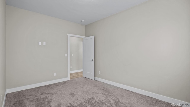 681 Eadin Ln, Grand Junction, CO 81504 - carpeted spare room featuring baseboards and a smoke detector