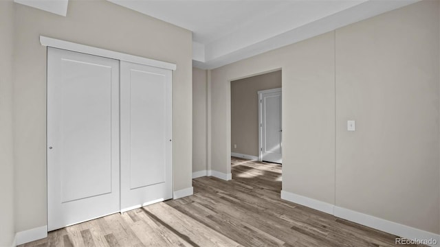 681 Eadin Ln, Grand Junction, CO 81504 - unfurnished bedroom featuring wood finished floors and a closet