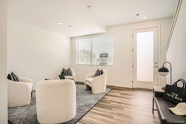 370 Geneva St, Aurora, CO 80010 - living area featuring light wood finished floors and recessed lighting