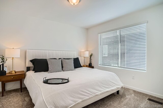 370 Geneva St, Aurora, CO 80010 - bedroom featuring carpet and baseboards