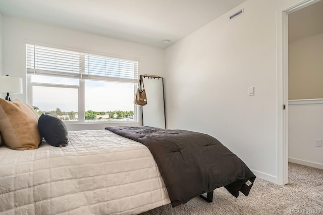 370 Geneva St, Aurora, CO 80010 - carpeted bedroom with baseboards