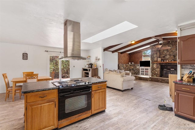 kitchen featuring light wood finished floors, vaulted ceiling with beams, a center island, island exhaust hood, and black electric range