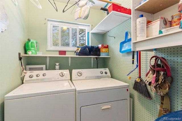 laundry area featuring laundry area and separate washer and dryer