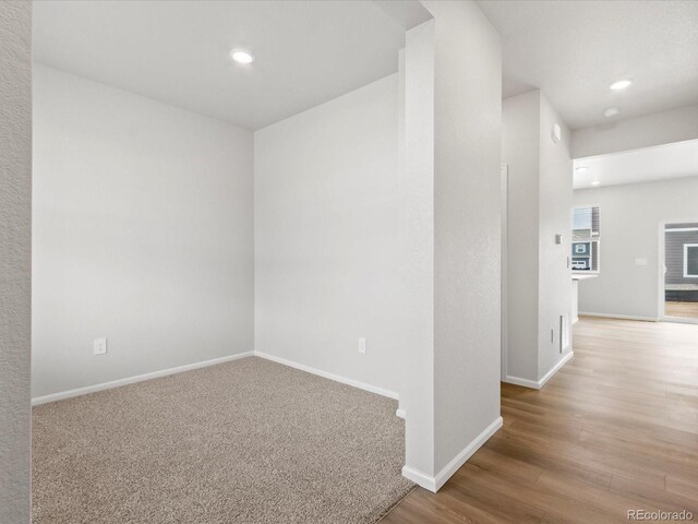 2720 73rd Avenue Ct, Greeley, CO 80634 - spare room featuring wood finished floors, baseboards, and recessed lighting