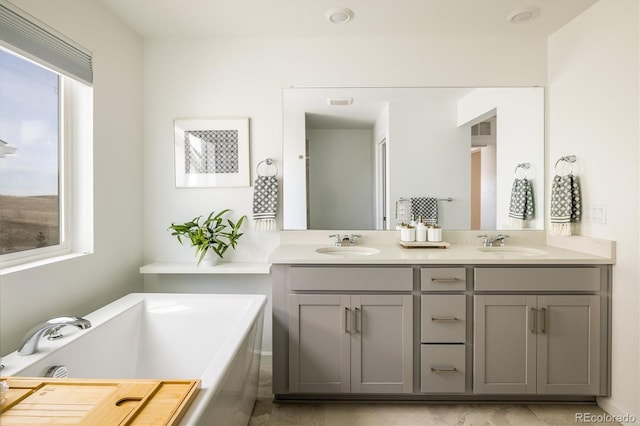 16568 W 92nd Pl, Arvada, CO 80007 - full bath featuring double vanity and a garden tub