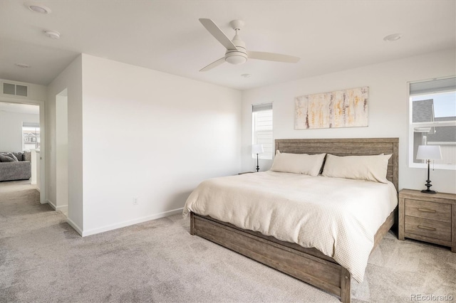 16568 W 92nd Pl, Arvada, CO 80007 - bedroom featuring carpet flooring, multiple windows, and a ceiling fan