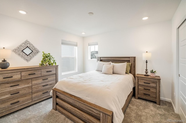 16568 W 92nd Pl, Arvada, CO 80007 - bedroom featuring light carpet and recessed lighting