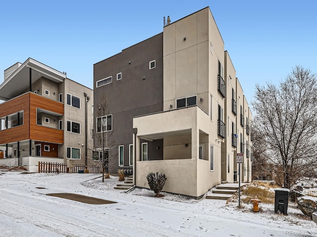 view of snow covered property