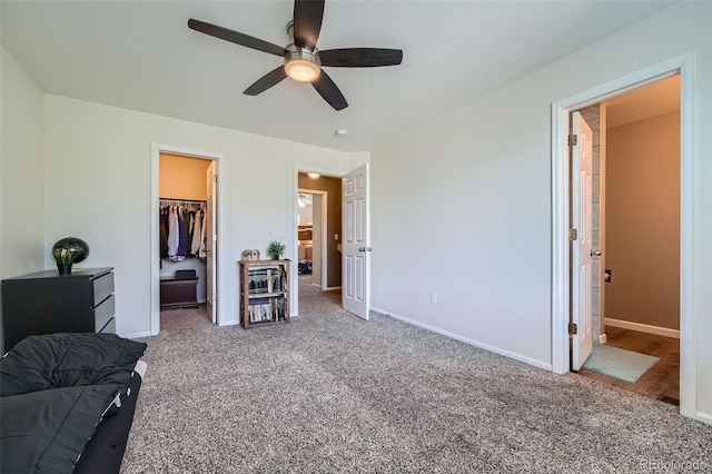 5534 S Wenatchee St, Aurora, CO 80015 - bedroom with carpet floors, a walk in closet, ceiling fan, and a closet