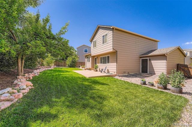 5534 S Wenatchee St, Aurora, CO 80015 - rear view of property with a patio area and a fenced backyard