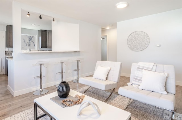 1476 W Dakota Ave, Denver, CO 80223 - living room featuring light wood-type flooring and recessed lighting