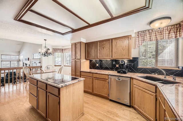 6726 Taft Cir, Arvada, CO 80004 - kitchen with a sink, black electric stovetop, dishwasher, an inviting chandelier, and decorative backsplash