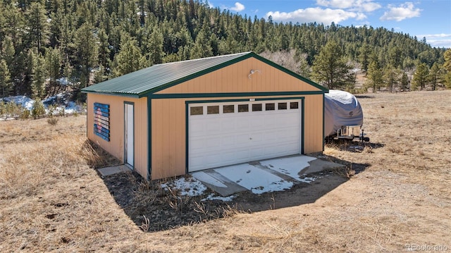 2555 New Mill Gulch Rd, Canon City, CO 81212 - detached garage with a wooded view