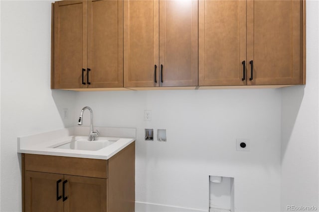 5621 W 141st Ln, Broomfield, CO 80020 - laundry room with hookup for an electric dryer, hookup for a washing machine, and cabinet space