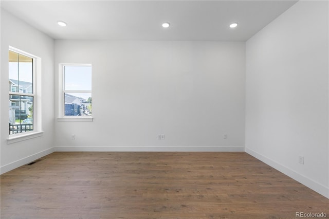 5621 W 141st Ln, Broomfield, CO 80020 - unfurnished room featuring wood finished floors and recessed lighting