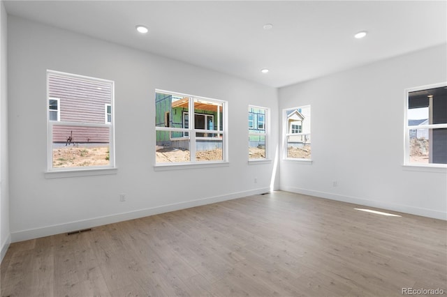 5621 W 141st Ln, Broomfield, CO 80020 - empty room featuring light wood-type flooring and recessed lighting