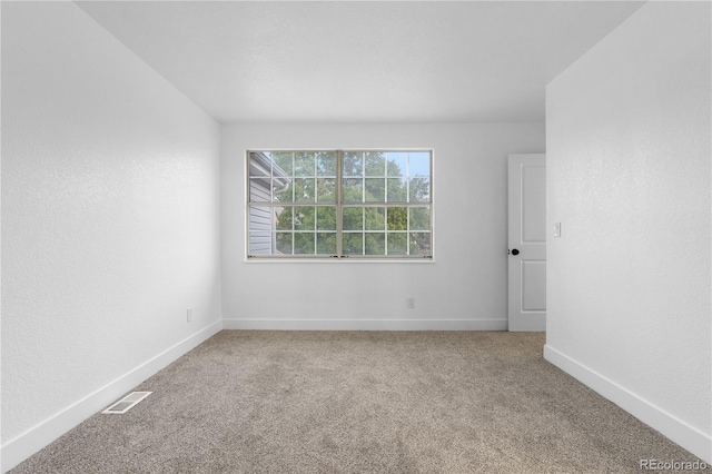 12635 E Pacific Cir Unit A, Aurora, CO 80014 - spare room featuring carpet flooring and baseboards