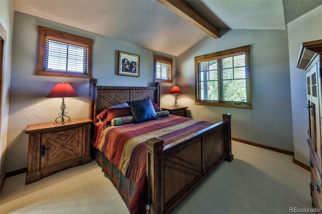 bedroom featuring light carpet, vaulted ceiling with beams, and multiple windows