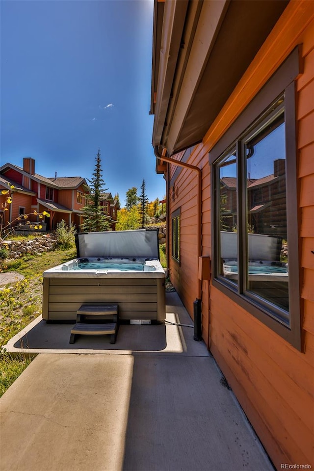 view of patio featuring a hot tub