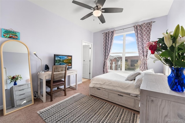 carpeted bedroom with a ceiling fan