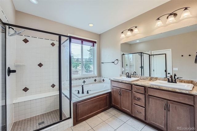 23993 E Briarwood Dr, Aurora, CO 80016 - full bath with double vanity, a shower stall, a garden tub, tile patterned floors, and recessed lighting