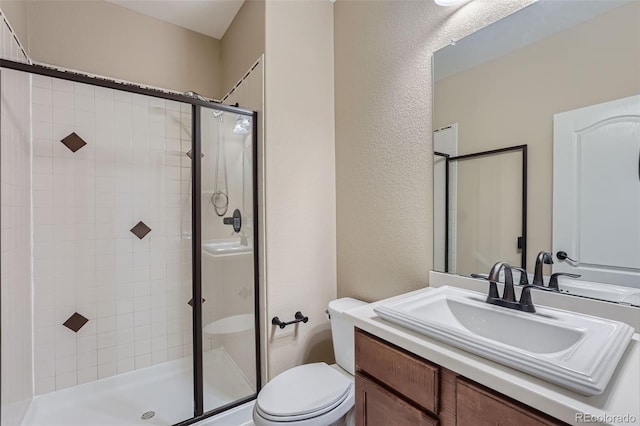 23993 E Briarwood Dr, Aurora, CO 80016 - bathroom with a shower stall, vanity, and a textured wall