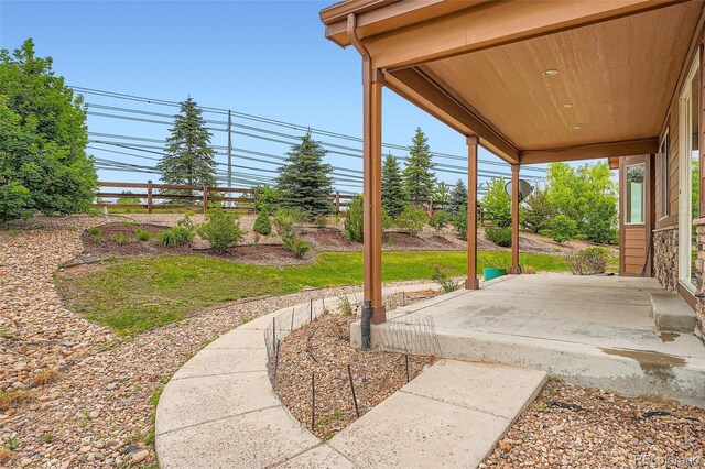 23993 E Briarwood Dr, Aurora, CO 80016 - view of yard featuring a patio