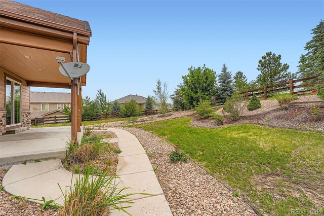 23993 E Briarwood Dr, Aurora, CO 80016 - view of yard featuring a patio area