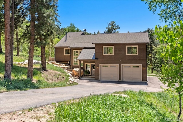 view of front of property featuring a garage