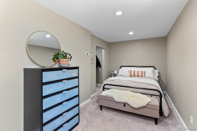 bedroom featuring light colored carpet