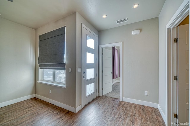 entrance foyer featuring hardwood / wood-style flooring