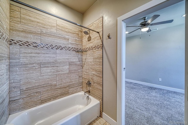 bathroom with tiled shower / bath combo and ceiling fan